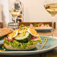Kasteel Café-lunchen data-src="https://kasteelradboud.nl/wp-content/uploads/2025/02/websiteproduct-lunchen.jpg"